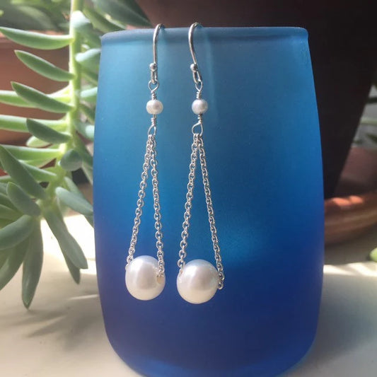 White Floating Pearl Earrings in Silver