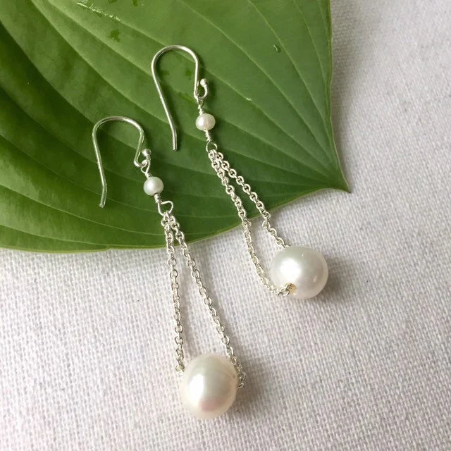 White Floating Pearl Earrings in Silver